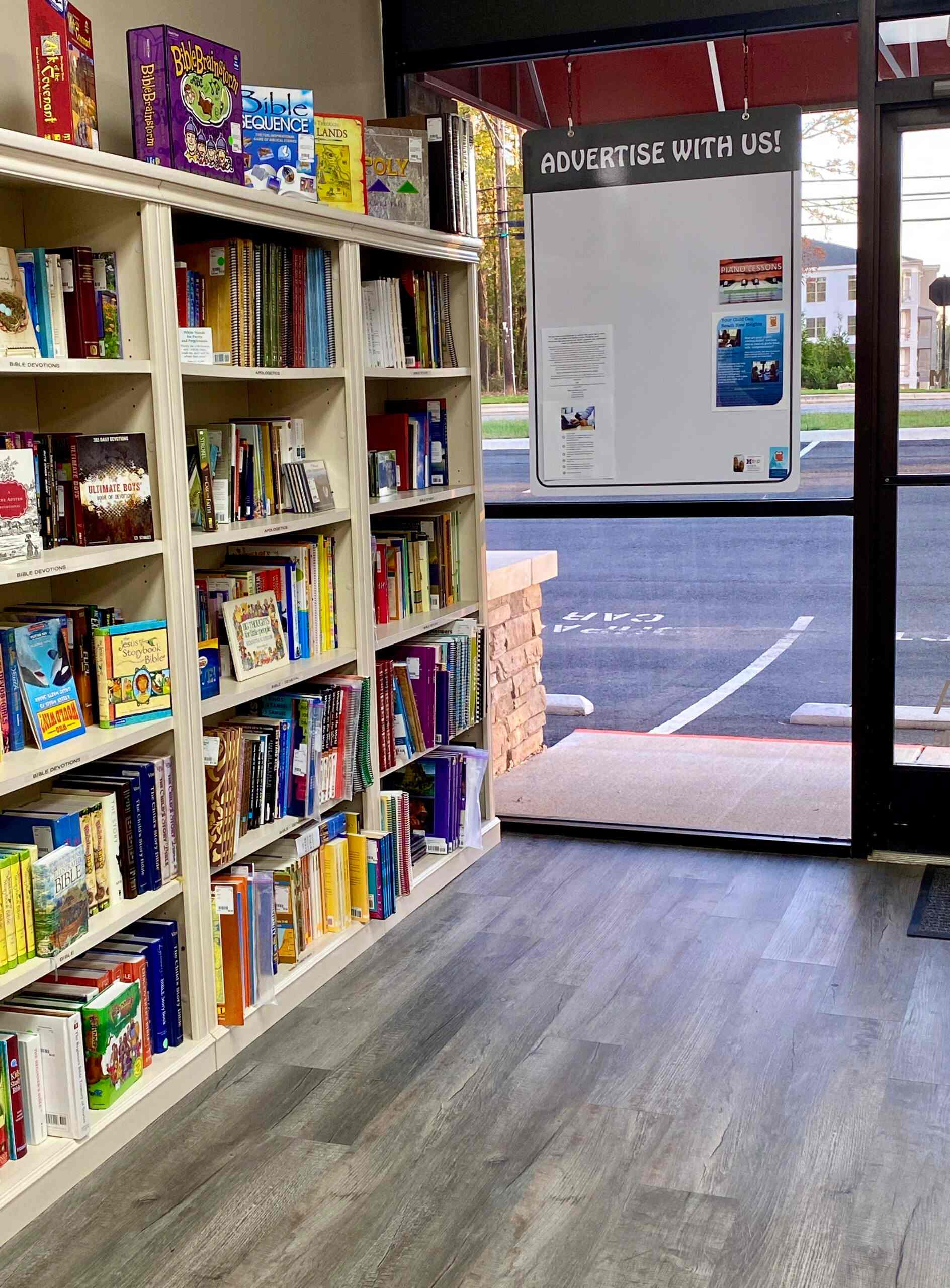 A book store with many books on the shelves.